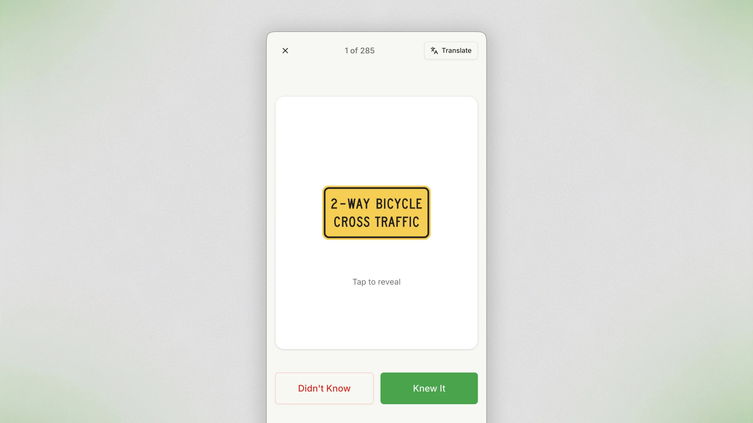 Road Signs flashcard showing the front of a sign card and the flipped back with sign name, full explanation, and driver action instructions